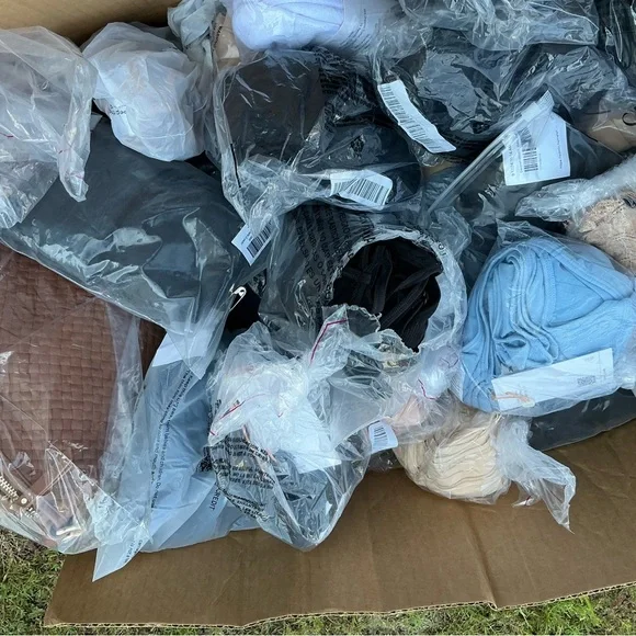 Quince Clothing Collection in Black, Blue, and Beige - Picture 1 of 4